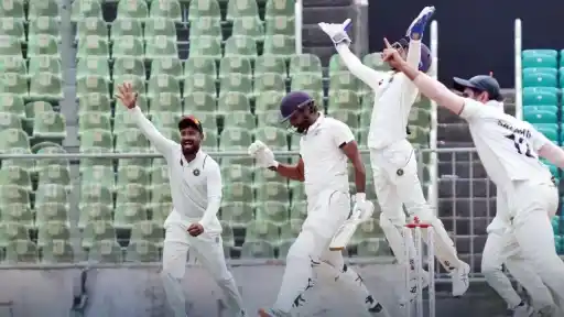 Kerala bowled out Gujarat for 455, securing a vital two-run first-innings lead in the Ranji Trophy semifinal. Teen star Jaymeet Patel’s gritty knock kept Gujarat in the fight, but a controversial decision hurt their chances.  