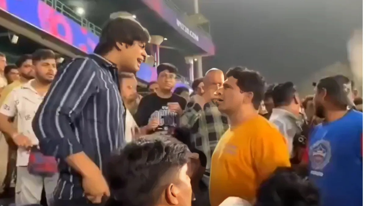 Fans fight in the stands during the DC vs RR match