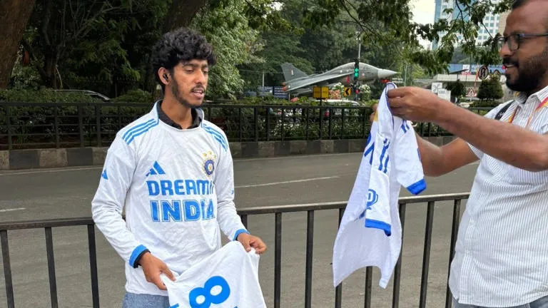 Virat Kohli in white jersey at M Chinnaswamy stadium