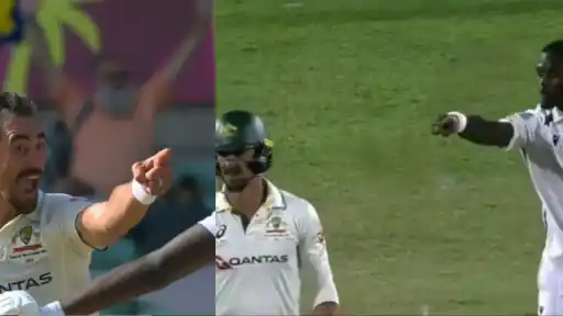 Mitchell Starc sledges back Jayden Seales.