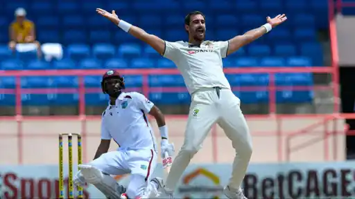 Mitchell Starc celebrated 400th Test wicket.