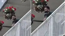 Virat Kohli argues with fan. 