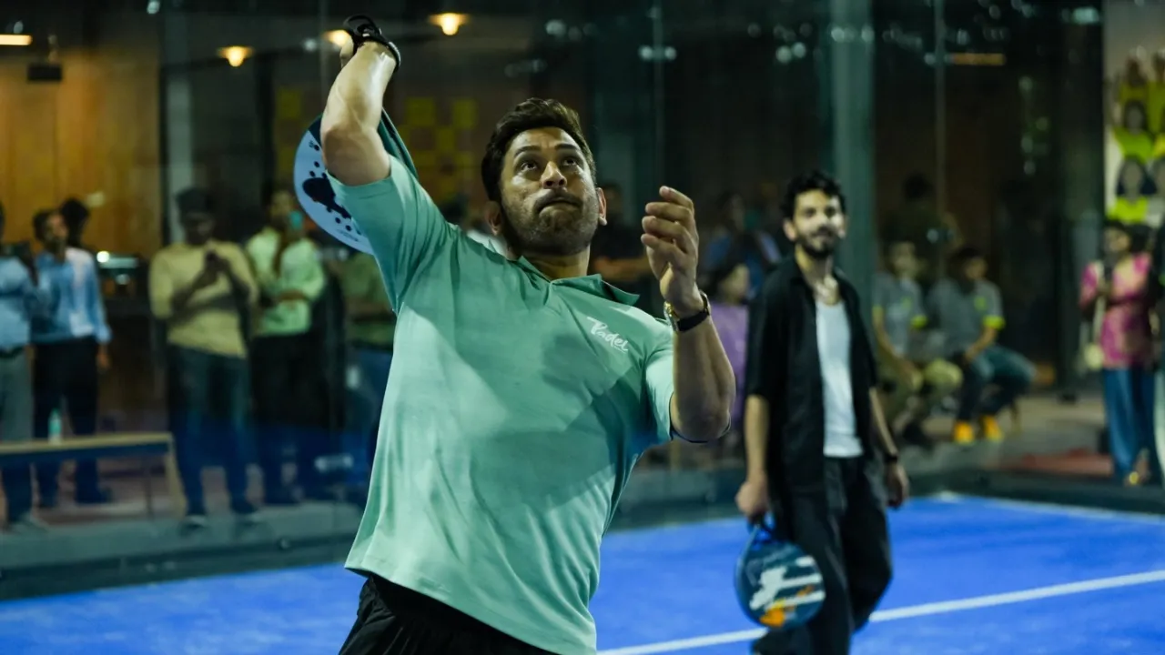 Anirudh Ravichander and MS Dhoni playing padel. 
