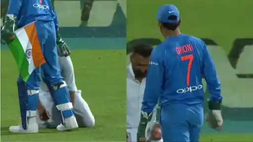 MS Dhoni prevents National flag touching ground.