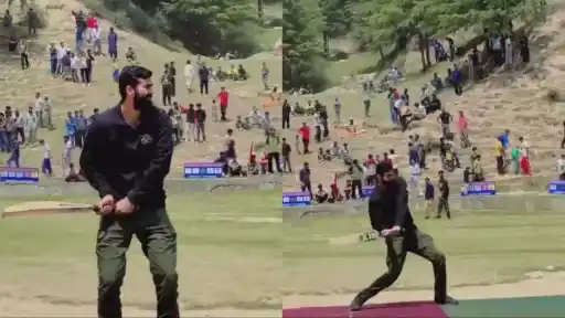 Indian Army playing cricket with Kashmiri locals.