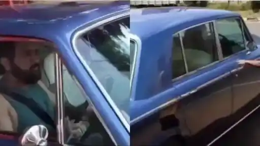 MS Dhoni rides in his Rolls-Royce.
