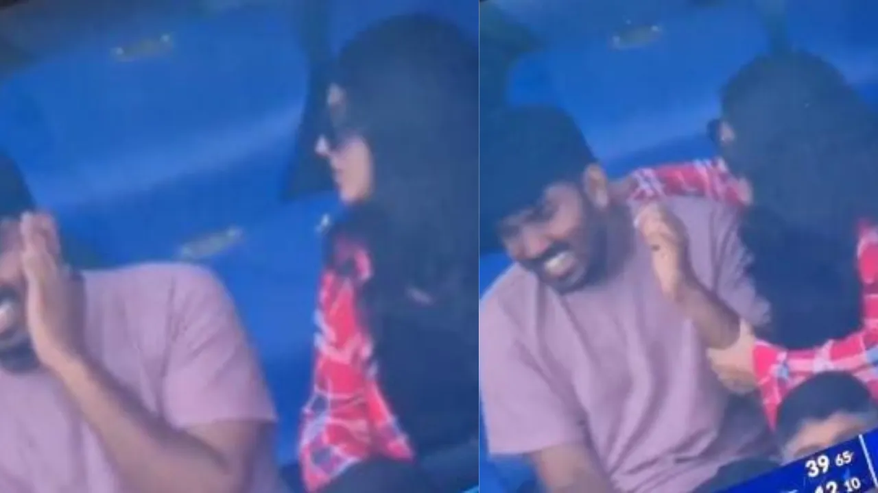 Girl playfully slaps and holds boy