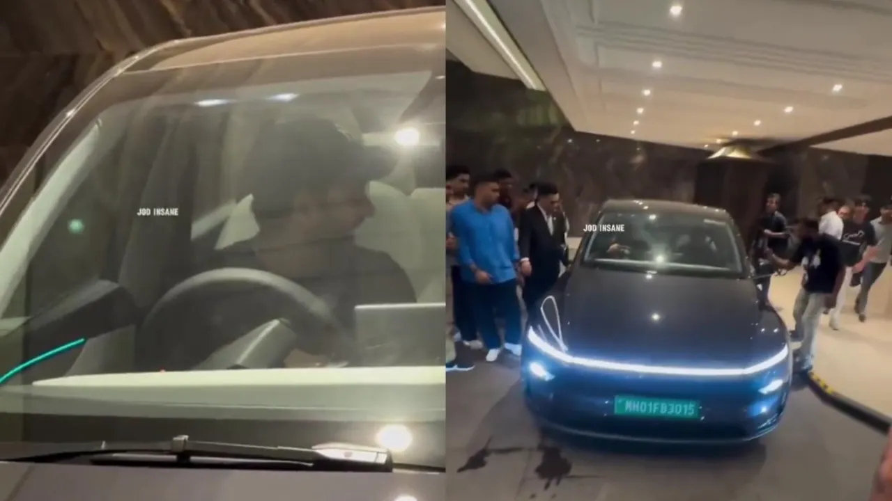 Rohit Sharma drives his Tesla car in Mumbai. 