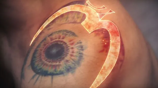 Virat Kohli OM symbol tattoo
