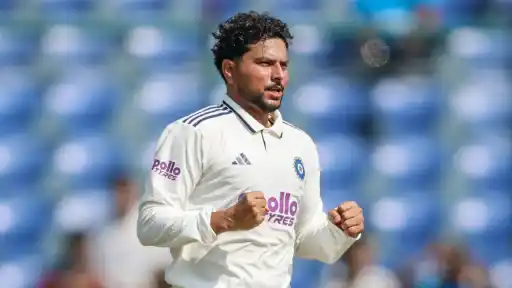 Kuldeep Yadav celebrates 5-fer with Jayden Seales' wicket. 