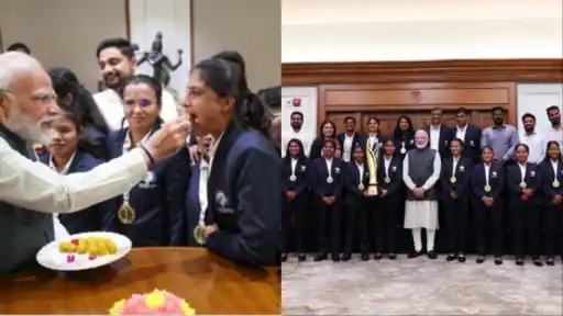 PM Narendra Modi feeds laddus to India's World Champion blind cricket team. 