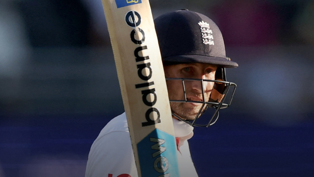 Joe Root celebrates maiden 100 in Australia. 