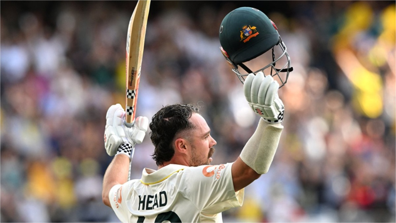 Travis Head celebrates fourth successive century in Adelaide. 