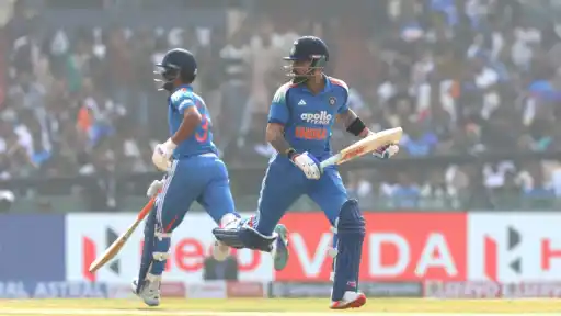 Virat Kohli and Ruturaj Gaikwad celebrate respective 50s.