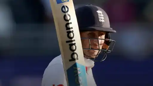 Joe Root celebrates maiden 100 in Australia.