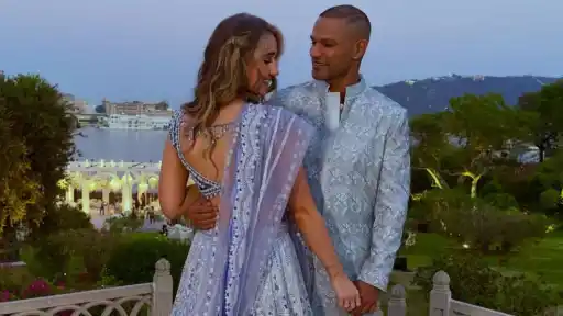 Sophie Shine and Shikhar Dhawan