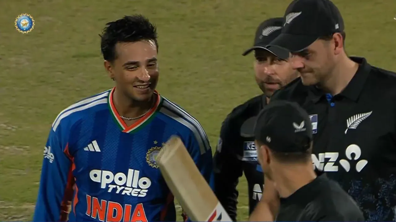 Players inspect Abhishek Sharma’s bat