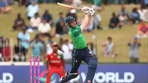 Lorcan Tucker celebrates 35-ball 50