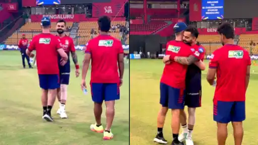 Virat Kohli and Kane Williamson hugging each other
