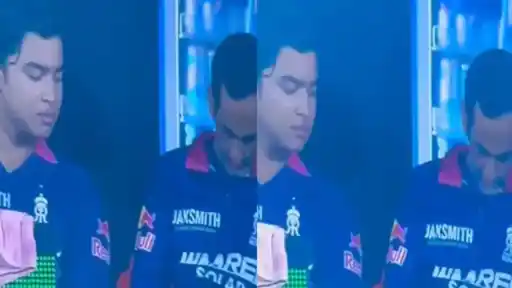 Vaibhav Suryavanshi using mobile phone during match