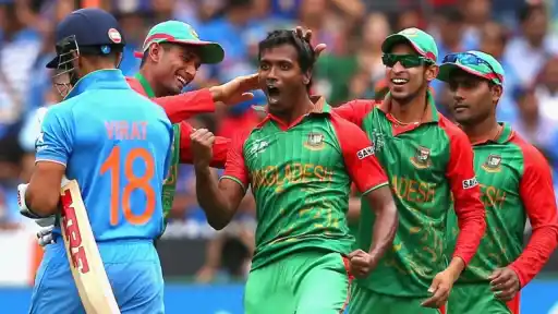 Rubel Hossain celebrating Virat Kohli’s wicket with teammates