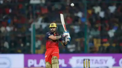 Virat Kohli hitting a six during RCB vs LSG IPL 2026 match