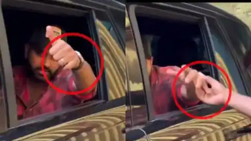 Rohit Sharma inside his car as fans reach through the window ahead of MI vs RCB IPL 2026 Match 54