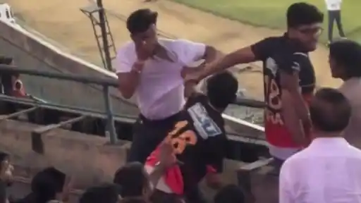 RCB fans fighting among themselves in Raipur stands during MI vs RCB IPL 2026 Match 54 — viral video