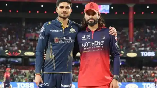 Gujarat Titans players celebrating during IPL 2026 — GT qualification scenarios for second place finish and potential Qualifier 1 clash against RCB