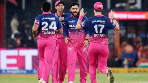 Rajasthan Royals players celebrating after beating Lucknow Super Giants in IPL 2026 at Jaipur — RR keep playoff qualification hopes alive