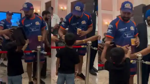 Rohit Sharma reacting warmly to a fan's Mumbai Cha Raja chant during an IPL 2026 match