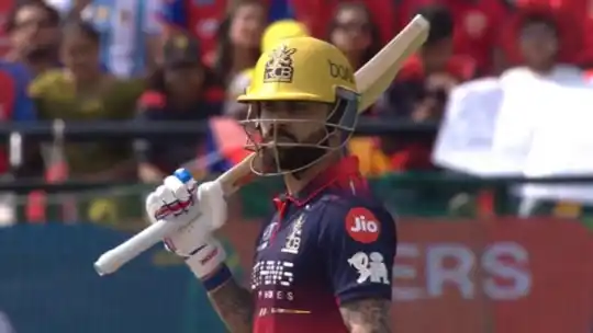 Virat Kohli celebrating historic milestone of 1000+ IPL runs against four different teams during RCB vs PBKS in Dharamsala IPL 2026