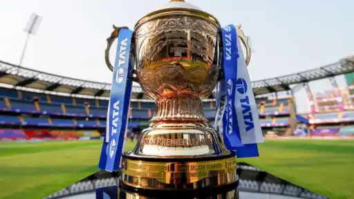 BCCI logo and IPL trophy as BCCI considers shifting the IPL window from March–May to September–October