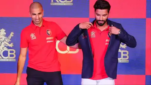 Mo Bobat and Rajat Patidar at RCB jersey launch event for IPL 2026 wearing Royal Challengers Bengaluru red jersey