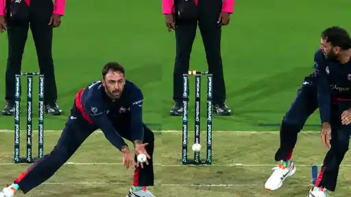 Glenn Maxwell collects the ball and throws down the stumps to run out Quinton de Kock during MLC 2026