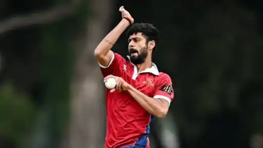 Jai Moondra bowling in Ireland cricket red jersey — Rajasthan-born pacer on T20I debut against India
