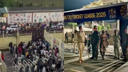 Crowds gathered outside JSCA Stadium Ranchi during the stampede-like situation at the Jharkhand T20 League 2026 final, with security personnel at the venue gate