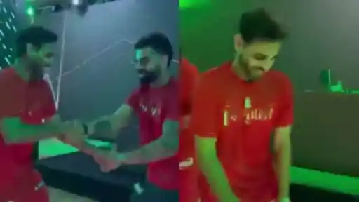 Virat Kohli and Bhuvneshwar Kumar performing the Kikli dance during RCB's IPL 2026 title celebration — viral video moment