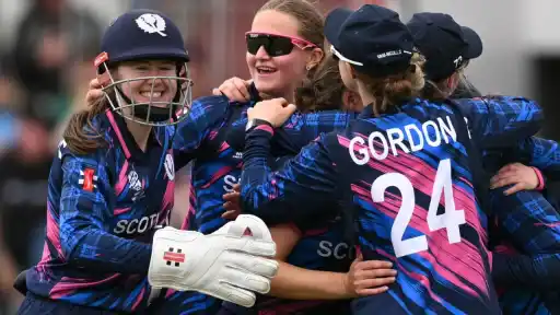 Scotland players celebrate their historic victory over Ireland during the Women's T20 World Cup 2026