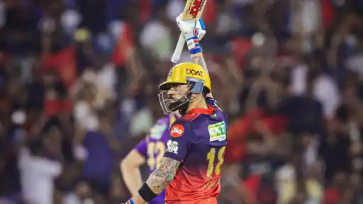 Virat Kohli celebrates after hitting his fastest ever IPL half-century during the RCB vs GT IPL 2026 Final