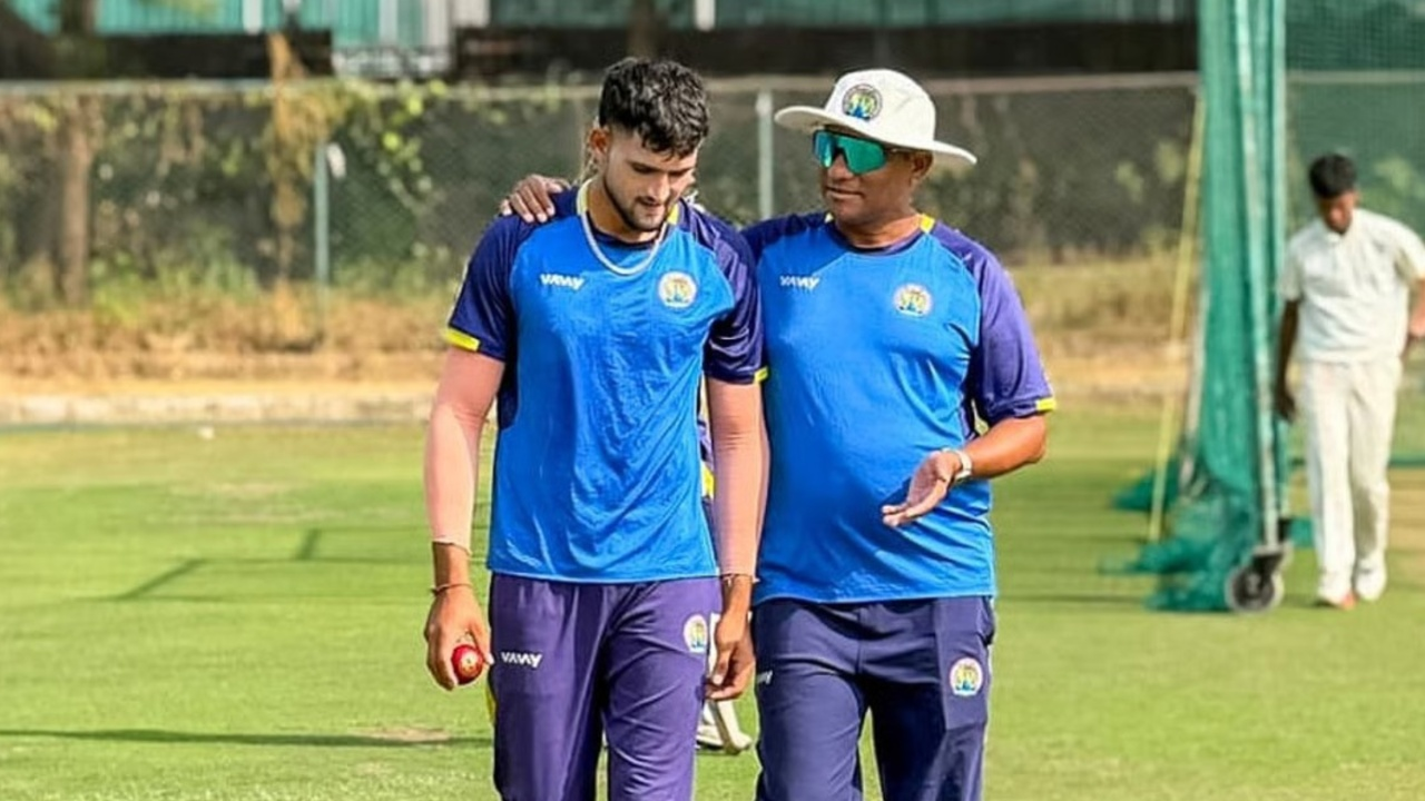 Ashok Sharma and his coach (Credit: Times of India)