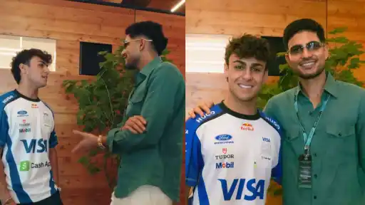 Shubman Gill poses with F1 driver Arvid Lindblad in the paddock at the 2026 British Grand Prix ahead of the England vs India ODI series