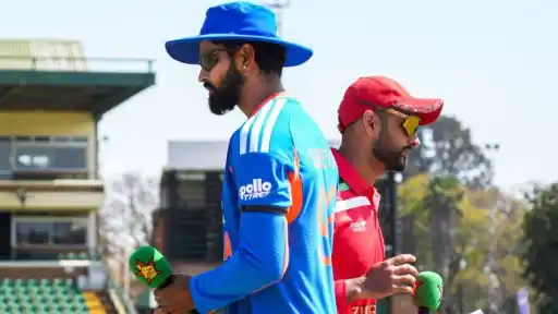 India and Zimbabwe players wearing black armbands during ZIM vs IND 2nd T20 in Harare, tribute to Sylvester Matshaka