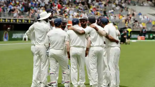 India players huddle together during a Test match — throwback to the era of the retiring former vice-captain and CSK star
