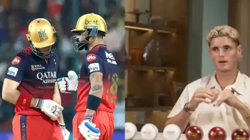 Jacob Bethell and Virat Kohli bump gloves on the field at Chinnaswamy during IPL 2026