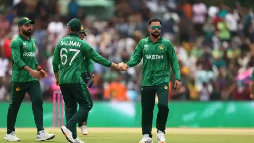 Mohammad Nawaz celebrates with Pakistan teammates on the field, banned by the ICC for breaching the anti-doping code