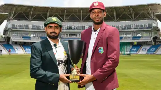 Pakistan captain Babar Azam and West Indies captain pose with the Test series trophy at Brian Lara Cricket Academy ahead of the Pakistan tour of West Indies 2026