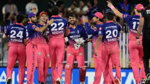 Rajasthan Royals players celebrate a wicket on the field as the franchise's $1.65 billion sale sparks a shareholder dispute ahead of IPL 2027