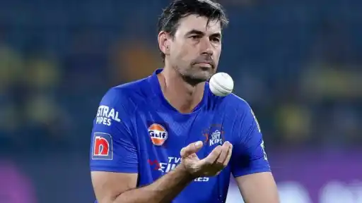 Stephen Fleming in CSK colors tossing the ball during his tenure as head coach, before taking up a new coaching role