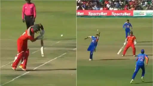 Yash Thakur stretches out to complete a one-handed return catch off his own bowling to dismiss Sikandar Raza in the ZIM vs IND 3rd T20I